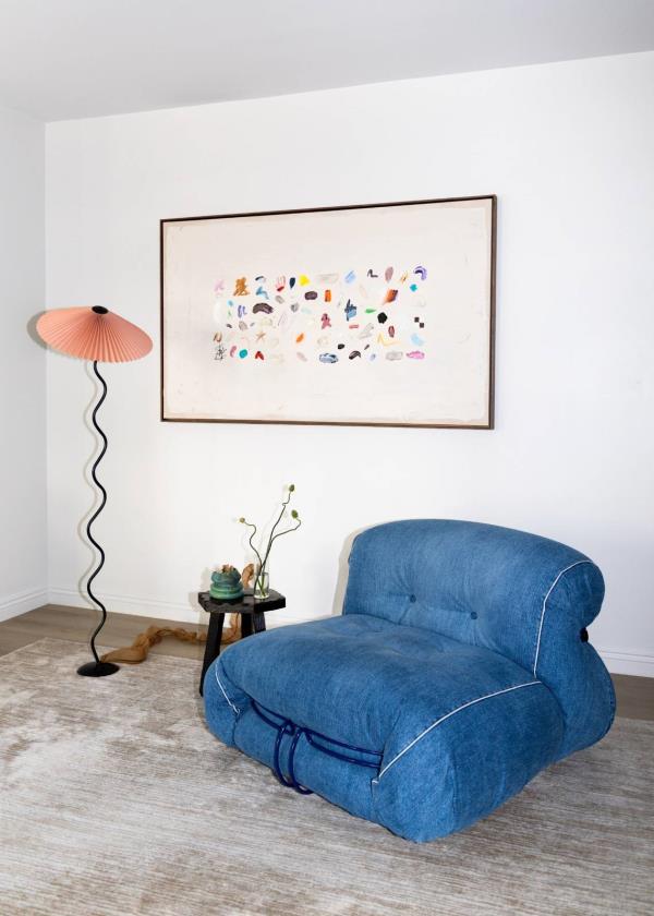  The denim Soriana lounge chair inside David Ko’s apartment  Photo: Paige Powell