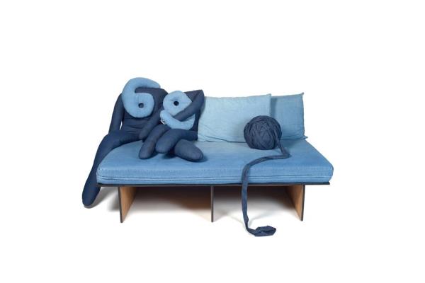  This denim couch wouldn’t be complete with the brand’s signature 69 pillows. Photo courtesy of 69