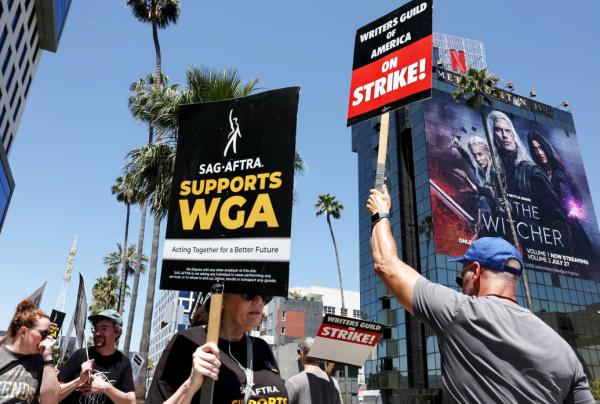 A photo including members of the SAG-AFTRA supporting the WGA Strike in Los Angeles.