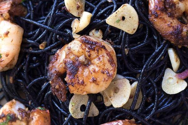 Slick and sumptuous: Jet-black squid ink pasta with garlic ‘sambal’ prawns